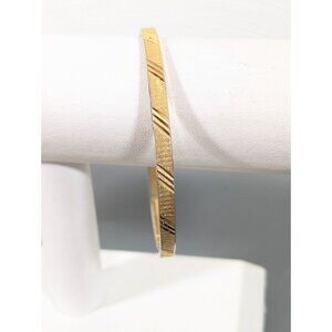 Vintage Monet Gold Tone Filigree Etched Bangle Bracelet L 8.5 in MCM Classic
